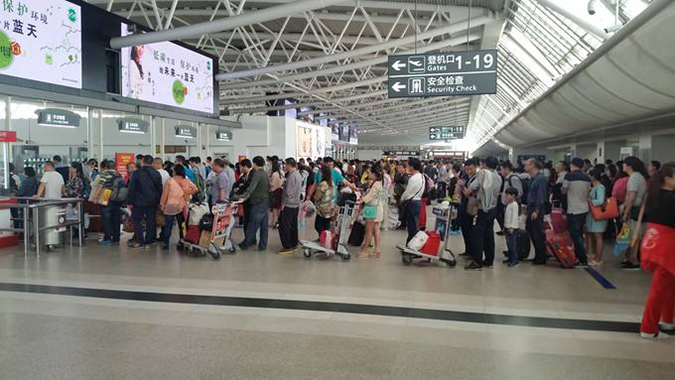 科技成果亮相春運安檢現場(chǎng)，人臉識別與掃碼齊上陣